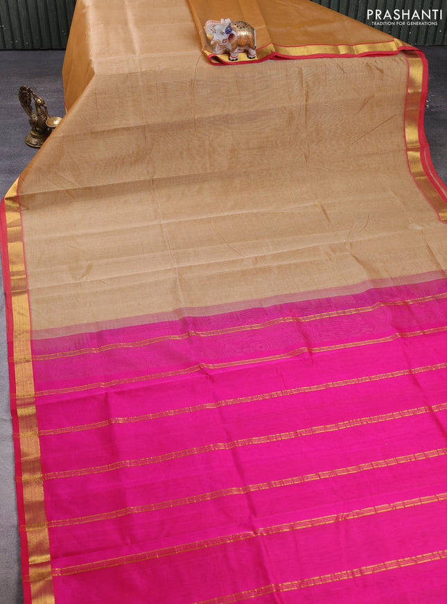 Silk cotton saree dark sandal and pink with plain body and zari woven border