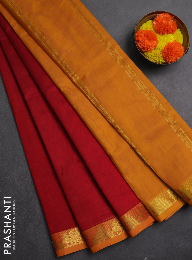Silk cotton saree maroon and dark mustard with plain body and annam & temple zari woven border