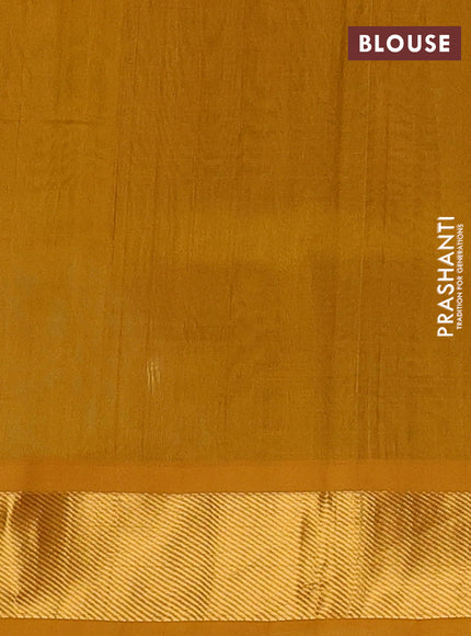 Silk cotton saree bottle green and mustard yellow with plain body and zari woven border
