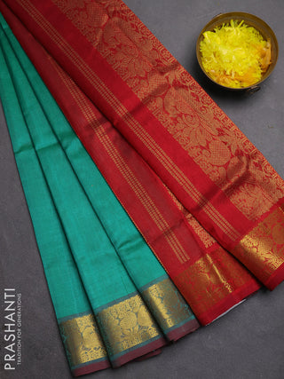 Silk cotton saree teal green and maroon with plain body and zari woven border