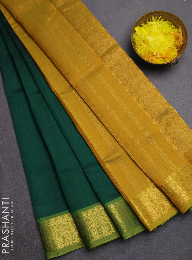 Silk cotton saree green and mehendi green with plain body and zari woven border