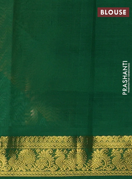 Silk cotton saree pale orange and green with plain body and zari woven border