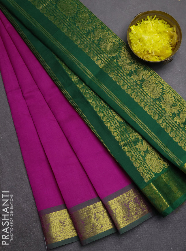 Silk cotton saree pink and green with plain body and zari woven border