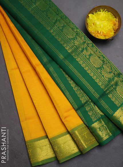 Silk cotton saree mango yellow and green with plain body and zari woven border