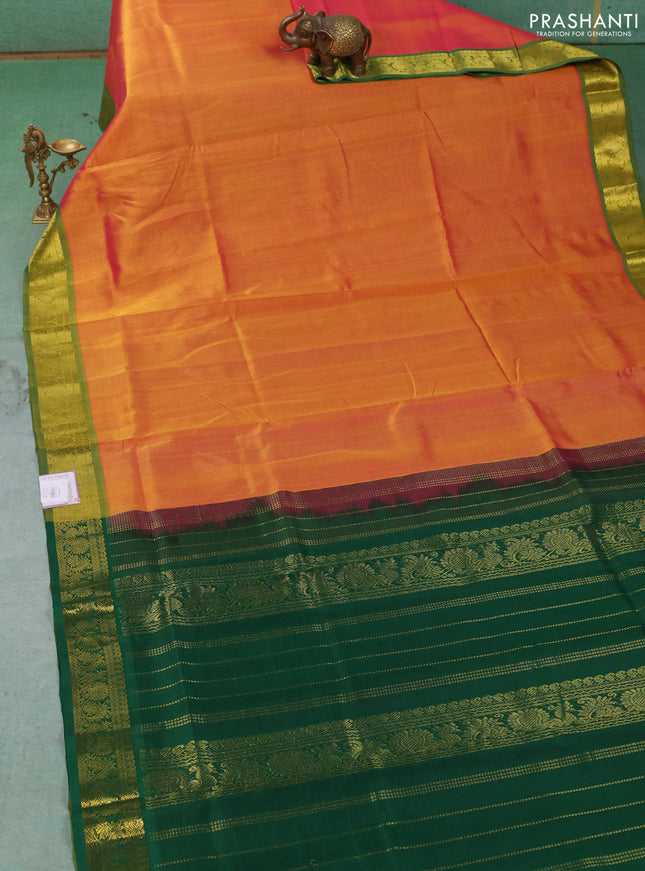 Silk cotton saree sunset orange and green with plain body and zari woven border