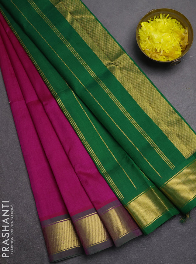 Silk cotton saree pink and green with plain body and zari woven border