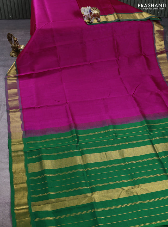 Silk cotton saree pink and green with plain body and zari woven border
