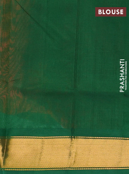 Silk cotton saree orange and green with plain body and zari woven border