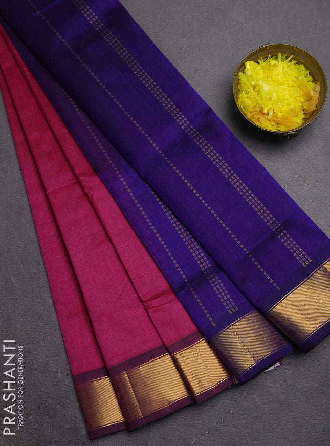 Silk cotton saree magenta pink and pacock blue with plain body and zari woven border