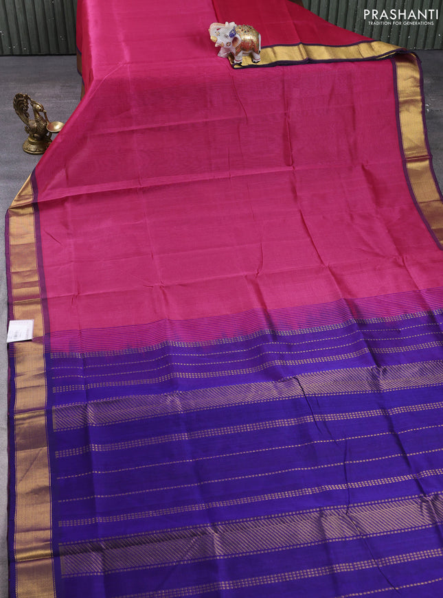 Silk cotton saree magenta pink and pacock blue with plain body and zari woven border