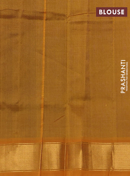 Silk cotton saree peacock blue and dark mustard with plain body and zari woven border