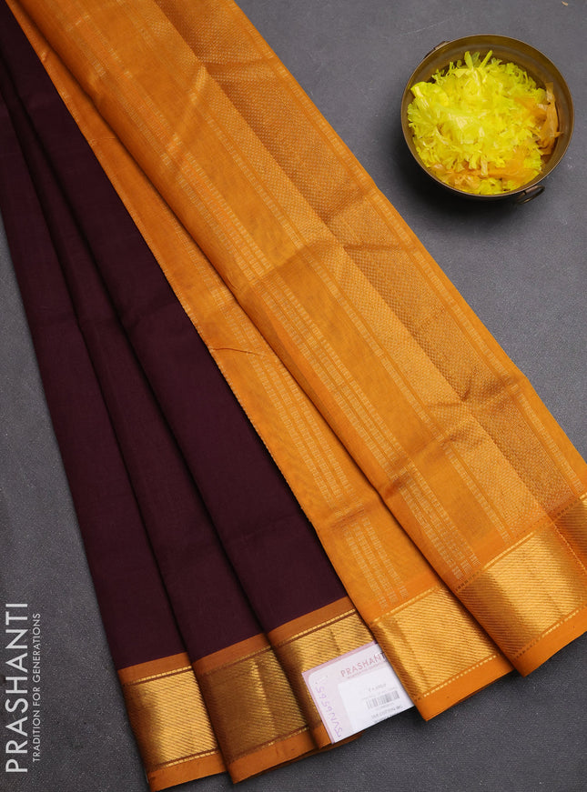 Silk cotton saree deep wine shade and dark mustard with plain body and zari woven border