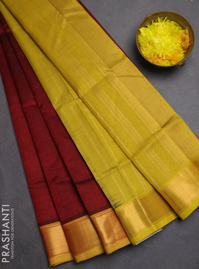 Silk cotton saree deep maroon and mustard green with allover stripe pattern and zari woven border