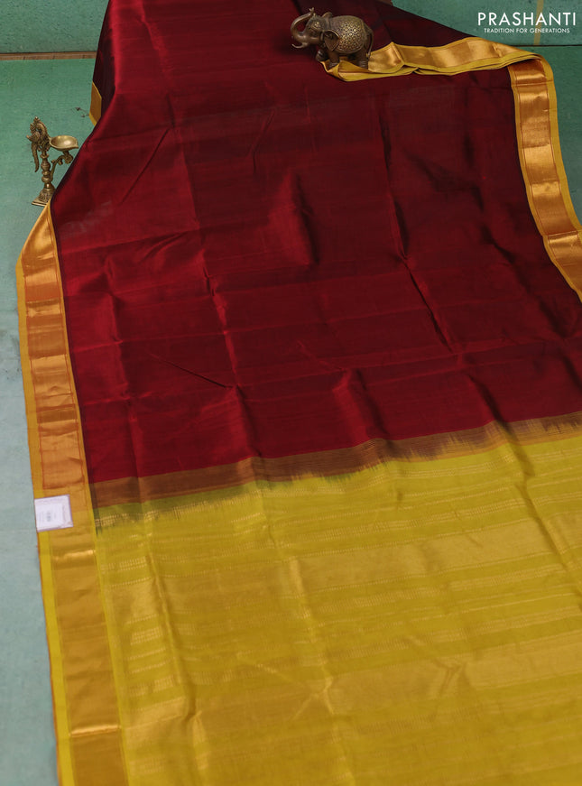 Silk cotton saree deep maroon and mustard green with allover stripe pattern and zari woven border