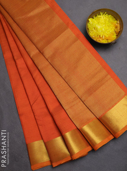 Silk cotton saree sunset orange with allover stripe pattern and zari woven border