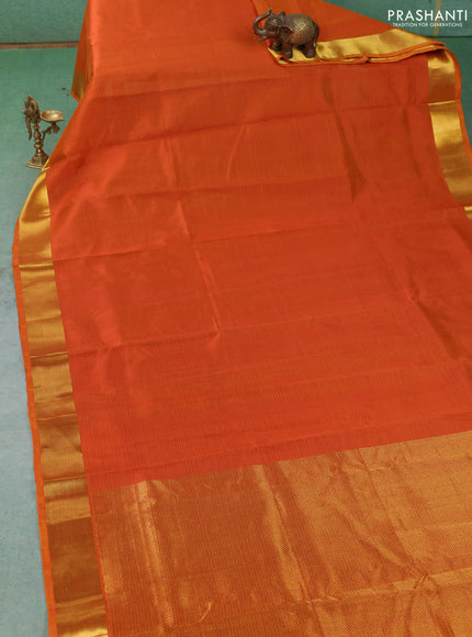 Silk cotton saree sunset orange with allover stripe pattern and zari woven border
