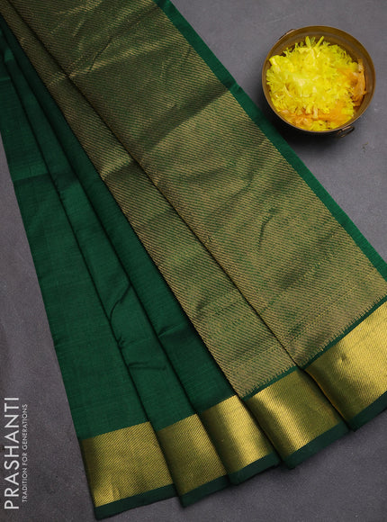 Silk cotton saree bottle green with plain body and zari woven border