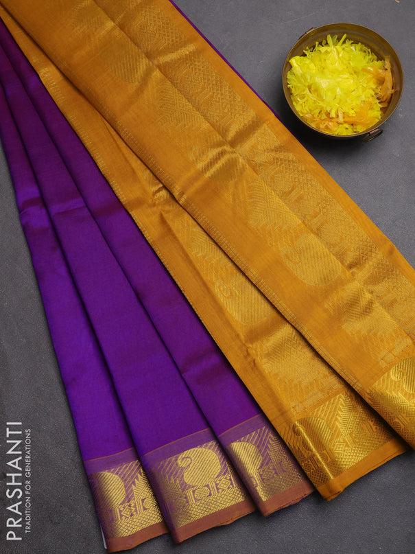 Silk cotton saree purple and mustard yellow with plain body and paisley & temple zari woven border