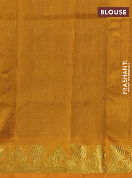 Silk cotton saree violet and mustard yellow with plain body and paisley & temple zari woven border