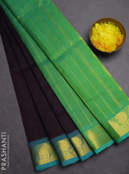 Silk cotton saree jamun shade and teal green with plain body and paisley & temple zari woven border