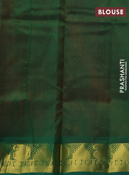 Silk cotton saree rust shade and green with plain body and paisley & temple zari woven border