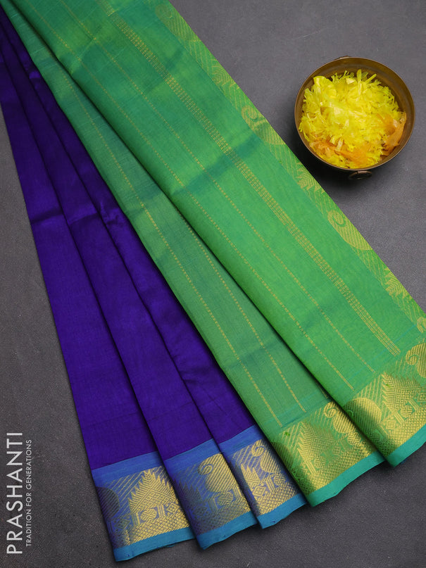 Silk cotton saree royal blue and teal green with plain body and paisley & temple zari woven border