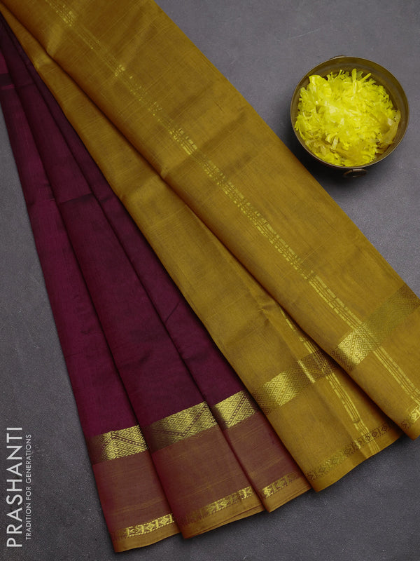Silk cotton saree deep wine shade and dark mustard with plain body and rettapet zari woven border
