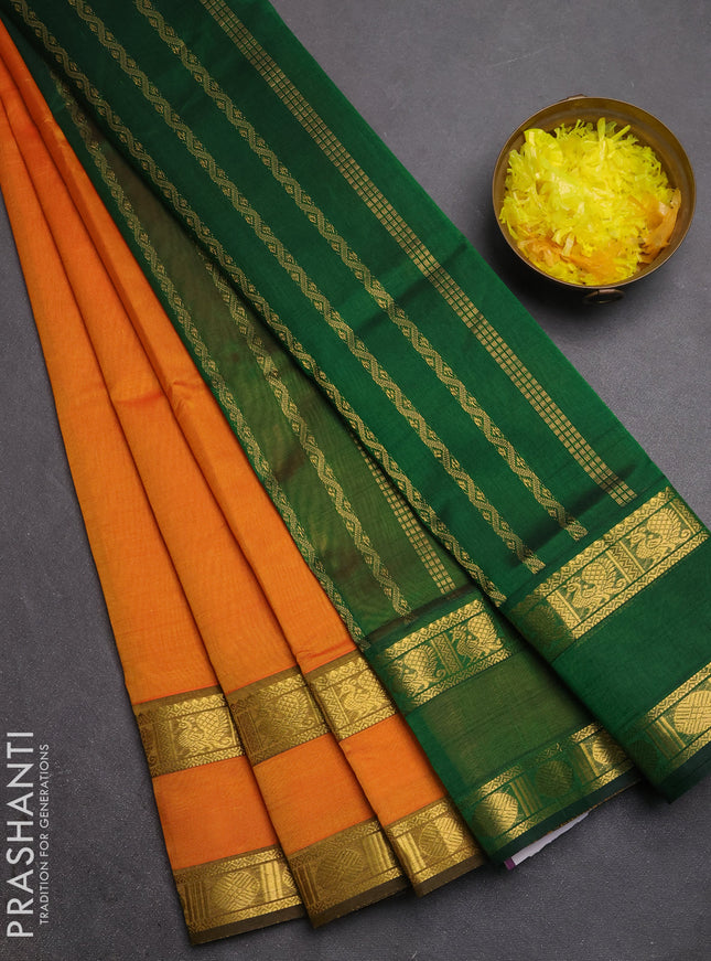 Silk cotton saree sunset orange and green with plain body and rettapet zari woven border