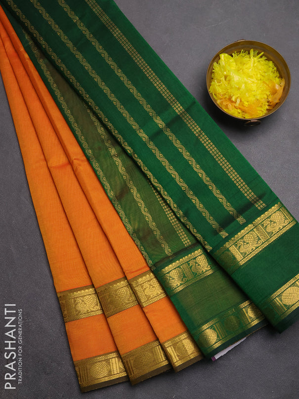 Silk cotton saree sunset orange and green with plain body and rettapet zari woven border