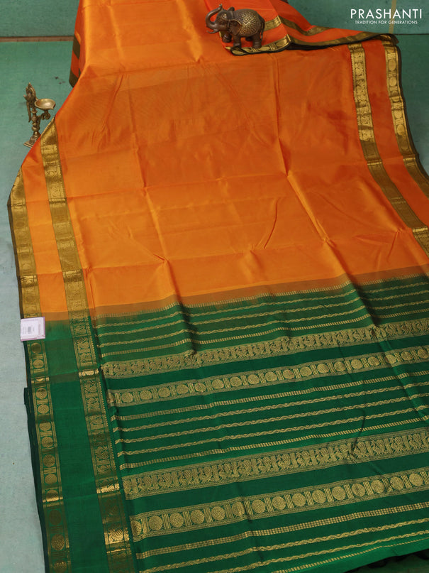 Silk cotton saree sunset orange and green with plain body and rettapet zari woven border