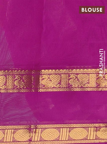 Silk cotton saree dark mustard and purple with plain body and rettapet zari woven border