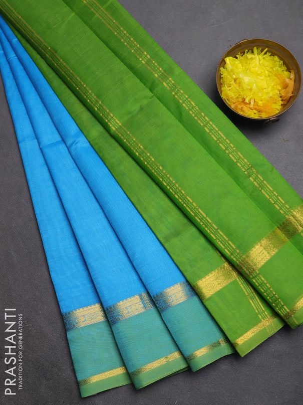 Silk cotton saree cs blue and light green with plain body and rettapet zari woven border