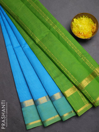 Silk cotton saree cs blue and light green with plain body and rettapet zari woven border