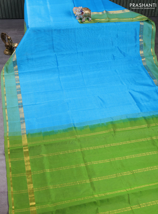 Silk cotton saree cs blue and light green with plain body and rettapet zari woven border
