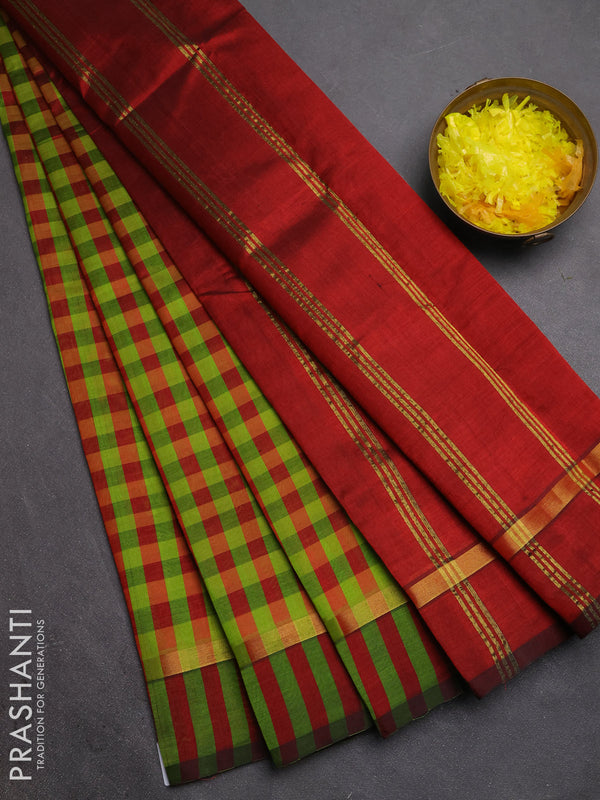 Silk cotton saree light green and maroon with allover paalum pazhamum checked pattern and zari woven simple border