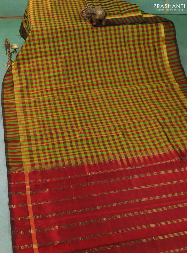 Silk cotton saree light green and maroon with allover paalum pazhamum checked pattern and zari woven simple border