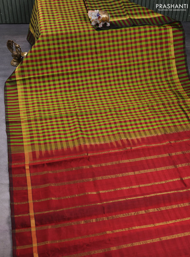 Silk cotton saree light green and maroon with allover paalum pazhamum checked pattern and zari woven simple border