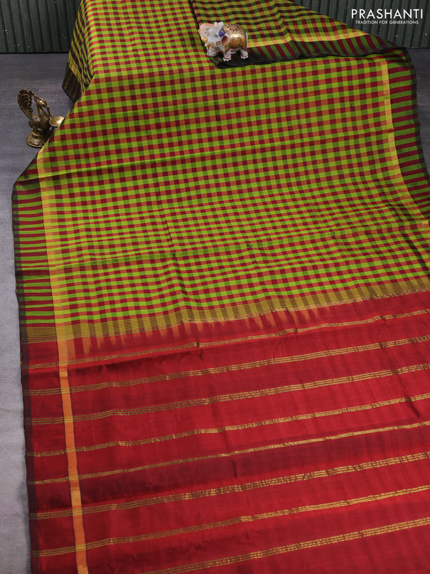 Silk cotton saree light green and maroon with allover paalum pazhamum checked pattern and zari woven simple border