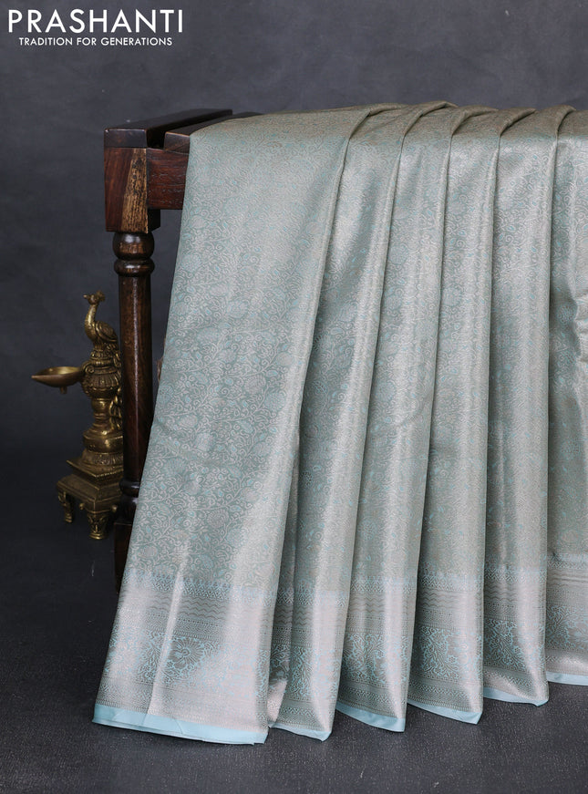 Bangalori tissue silk saree pastel blue with allover zari woven brocade weaves and zari woven border