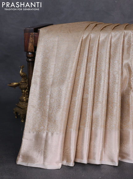 Bangalori tissue silk saree cream with allover zari woven brocade weaves and zari woven border
