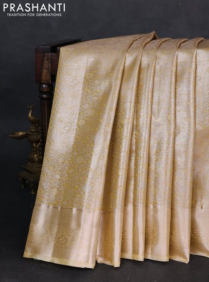 Bangalori tissue silk saree sandal with allover zari woven brocade weaves and zari woven border