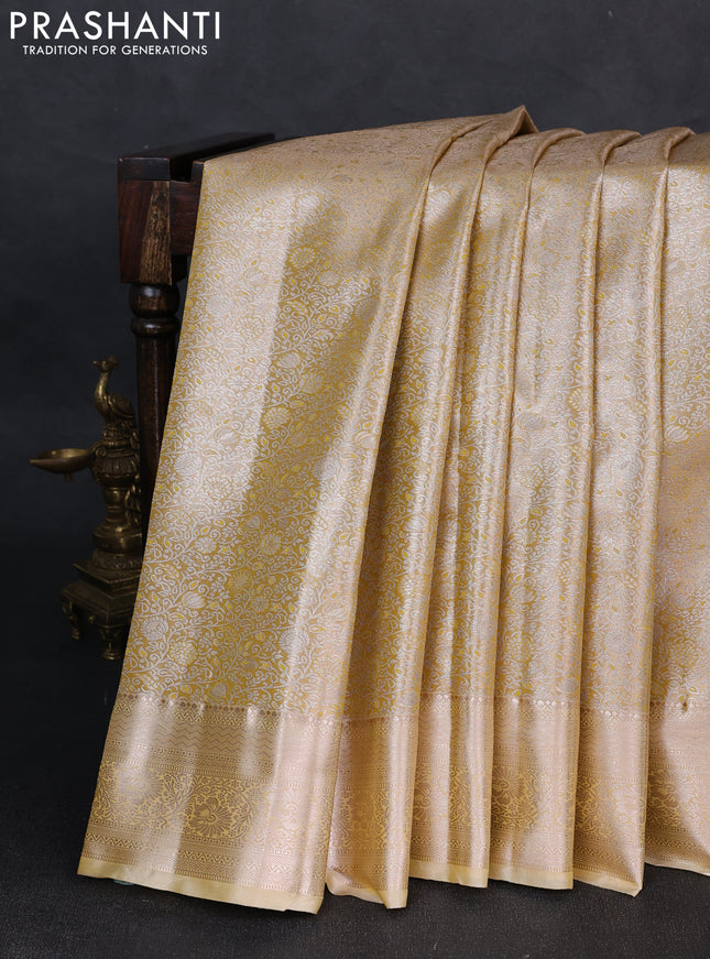 Bangalori tissue silk saree sandal with allover zari woven brocade weaves and zari woven border