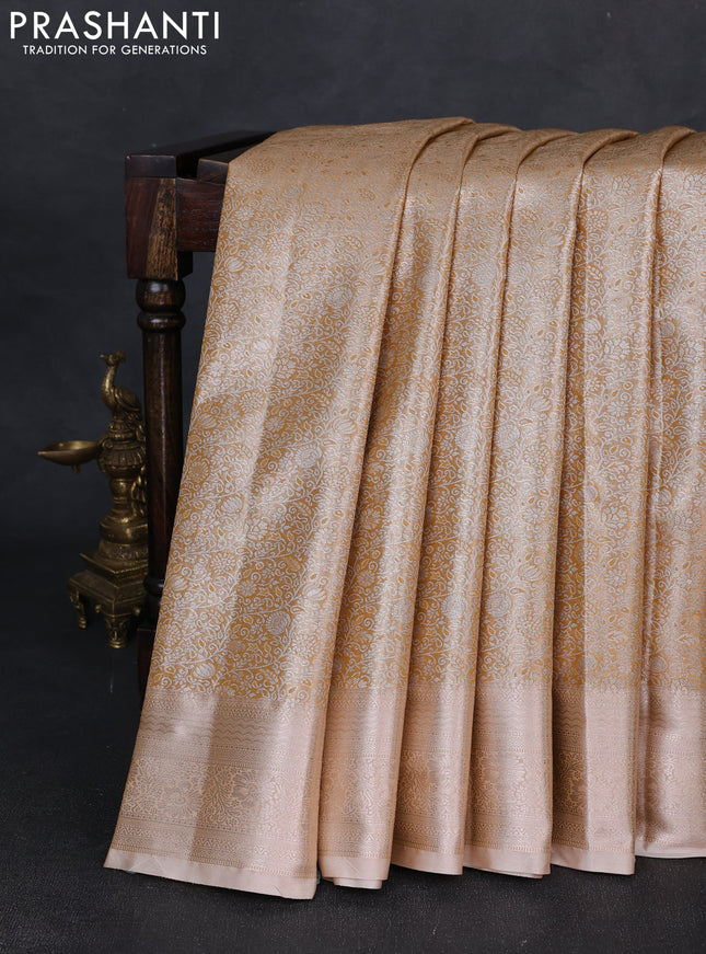 Bangalori tissue silk saree sandal with allover zari woven brocade weaves and zari woven border