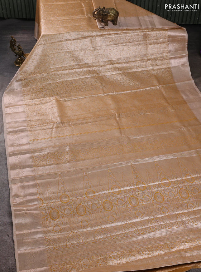 Bangalori tissue silk saree sandal with allover zari woven brocade weaves and zari woven border