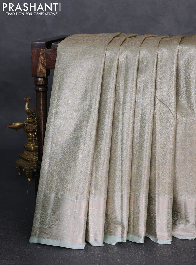 Bangalori tissue silk saree pista green with allover zari woven brocade weaves and zari woven border
