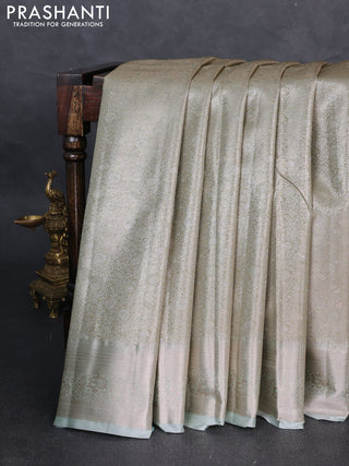 Bangalori tissue silk saree pista green with allover zari woven brocade weaves and zari woven border