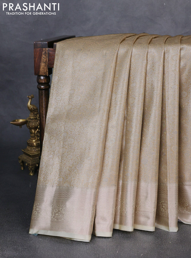Bangalori tissue silk saree cream with allover zari woven brocade weaves and zari woven border