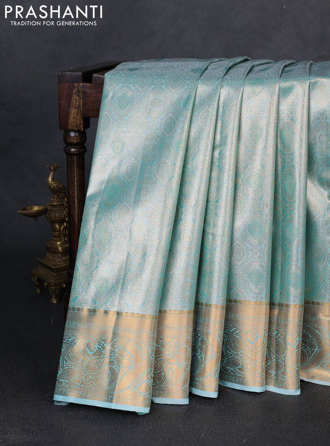 Bangalori tissue silk saree teal green with allover zari woven brocade weaves and zari woven border
