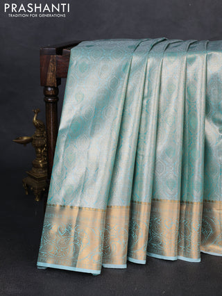Bangalori tissue silk saree teal green with allover zari woven brocade weaves and zari woven border