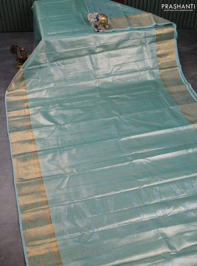 Bangalori tissue silk saree teal green with allover zari woven brocade weaves and zari woven border